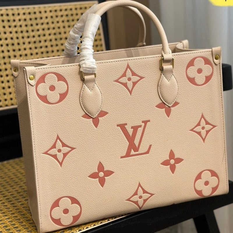 Bolsa con monograma Onthego color leche y rosa