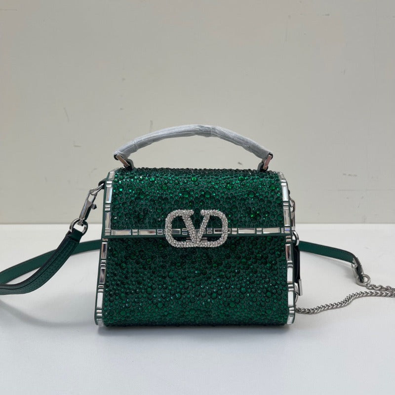 Bolso mini con asa superior y lentejuelas de cristal verde