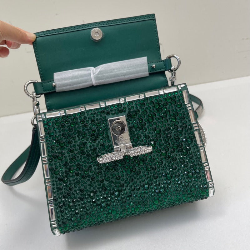 Bolso mini con asa superior y lentejuelas de cristal verde