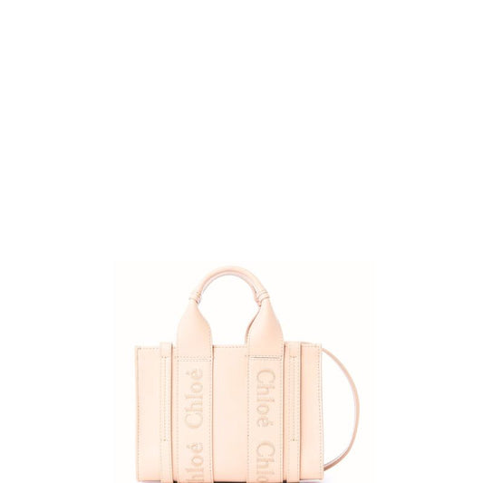 Kleine Tragetasche Woody aus weichem Leder Beige 