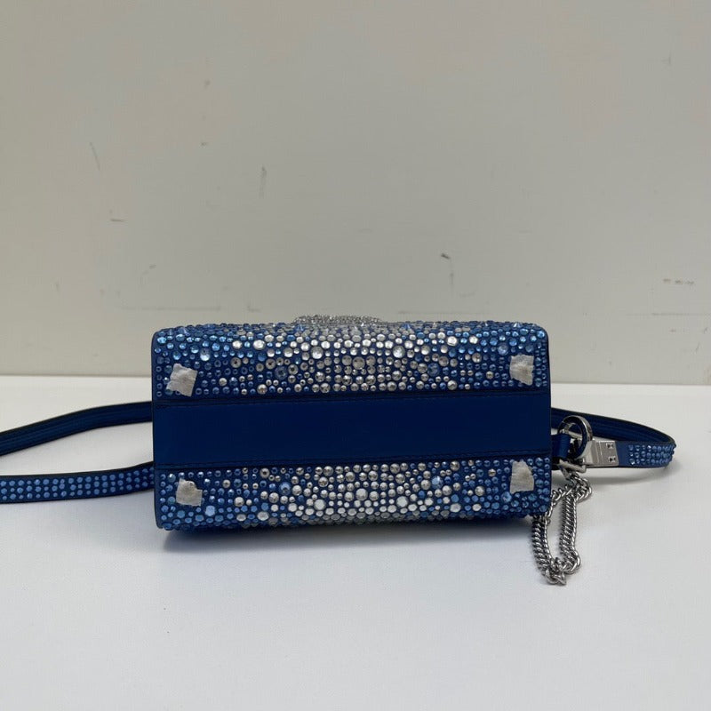 Bolso mini con lentejuelas de cristal y asa superior en azul y plata