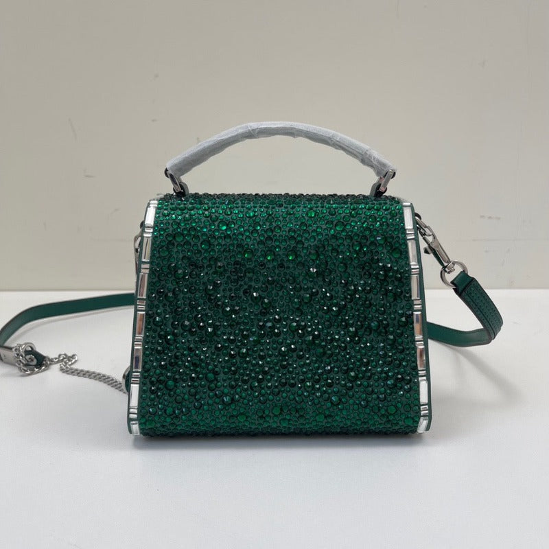 Bolso mini con asa superior y lentejuelas de cristal verde