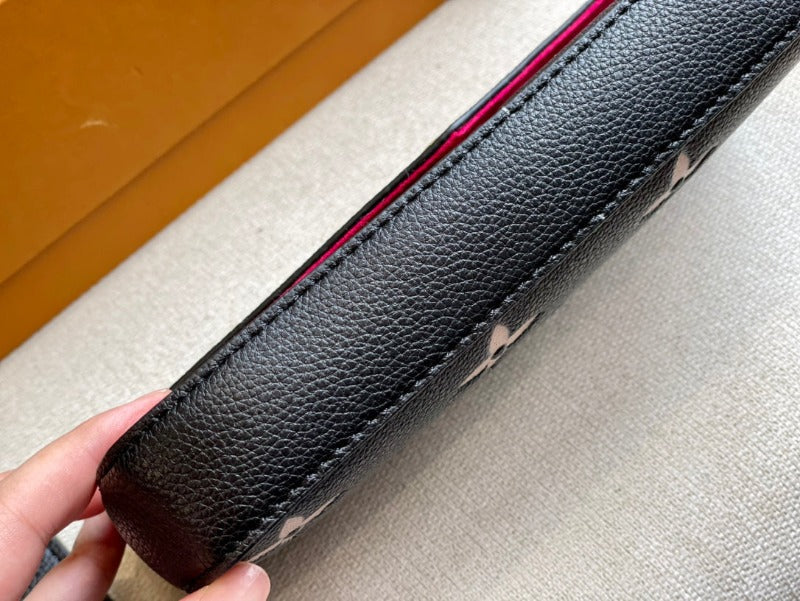 Pochette Felicie Monogram Empreinte Negro