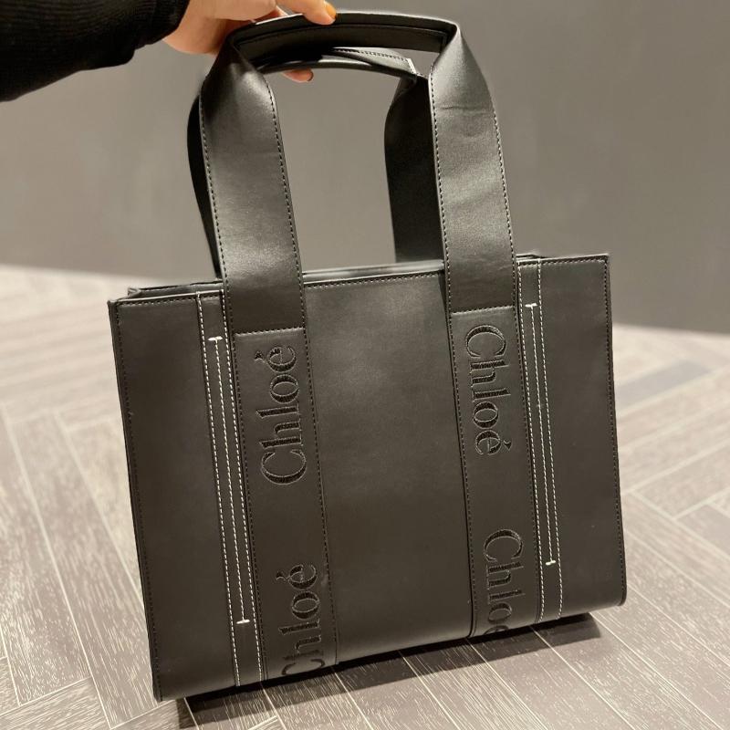 Woody Medium soft leather tote bag Black