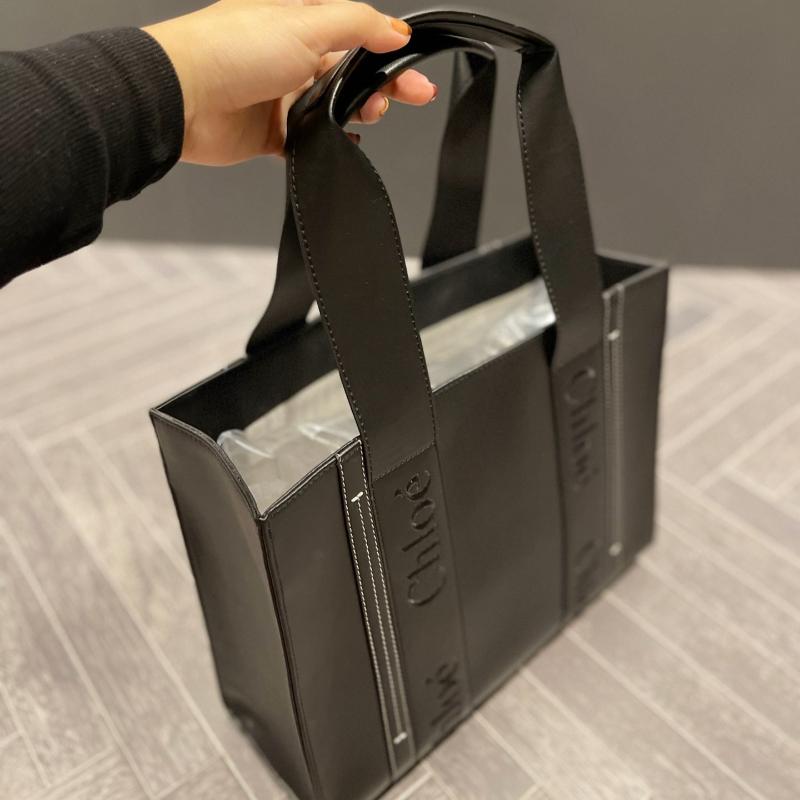 Woody Medium soft leather tote bag Black