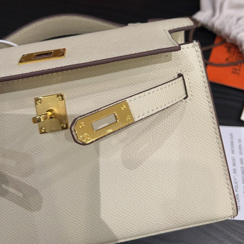 Kelly Pochette Handbag Ivory